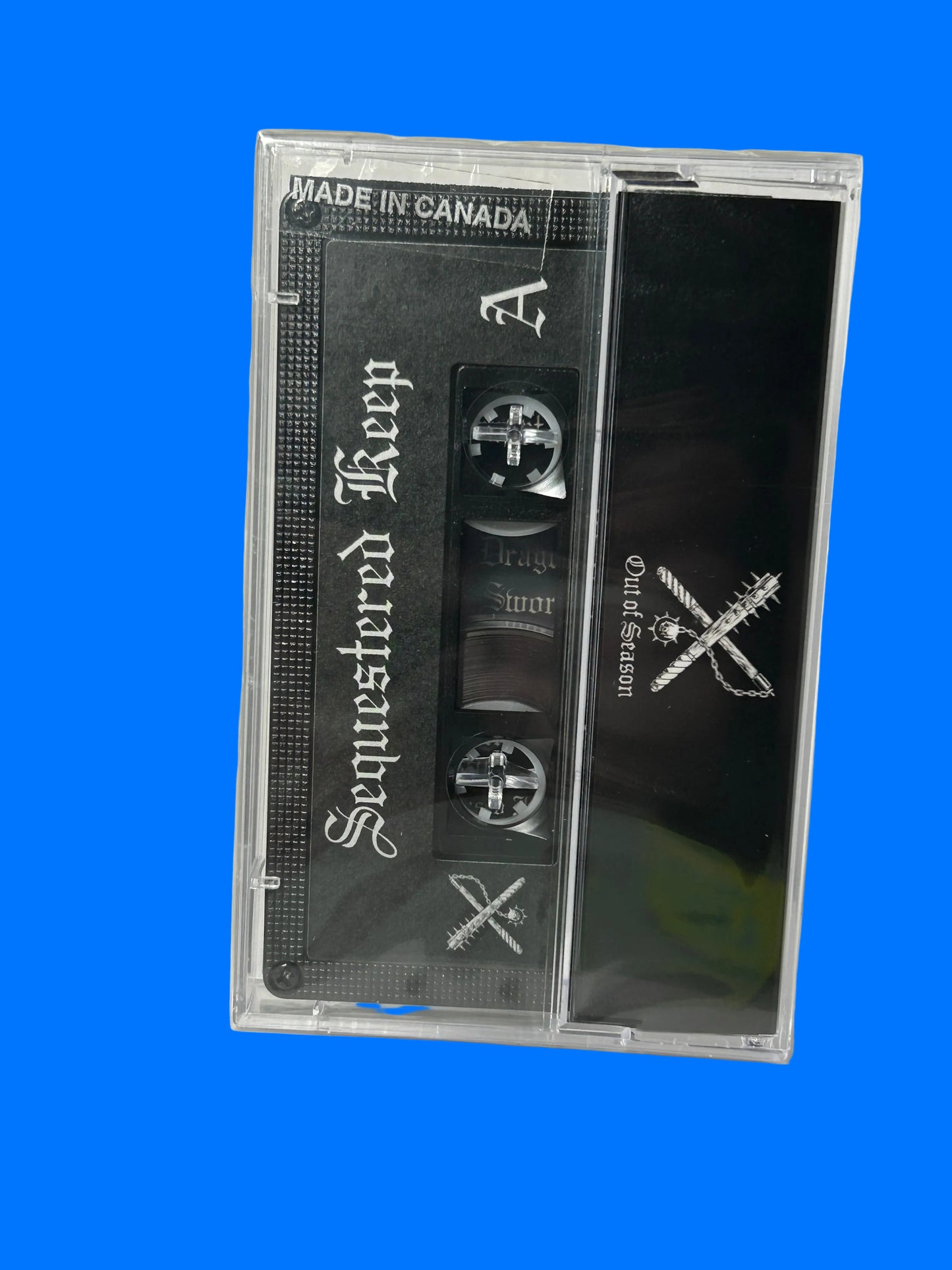 Cassette tape with 'Out of Season' and 'dary paapsanbas' text on a white background Sequestered Keep