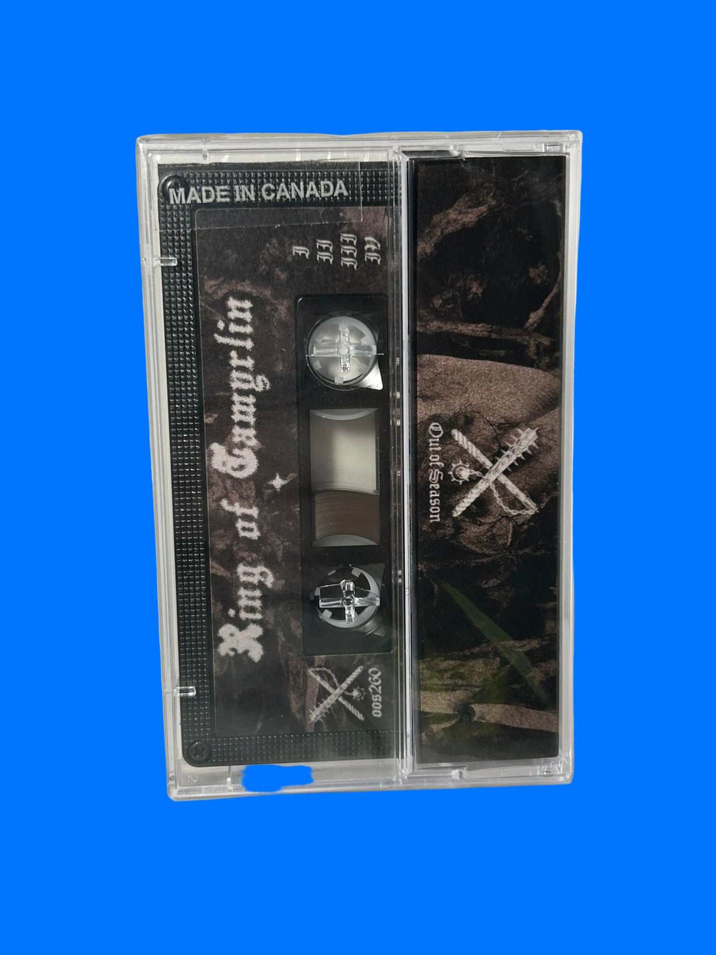 Cassette tape with a black and white design on a white background ring of tamyrlin