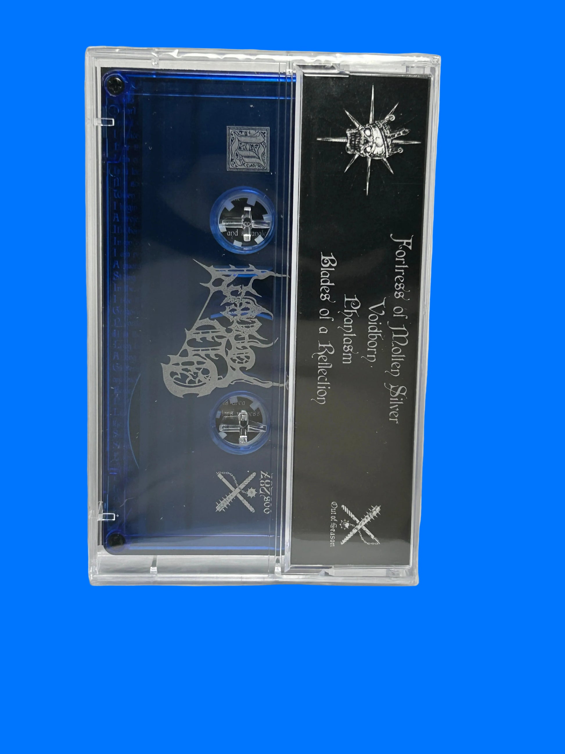 Cassette tape with black and blue design on a white background old sorcery sorrowcrown