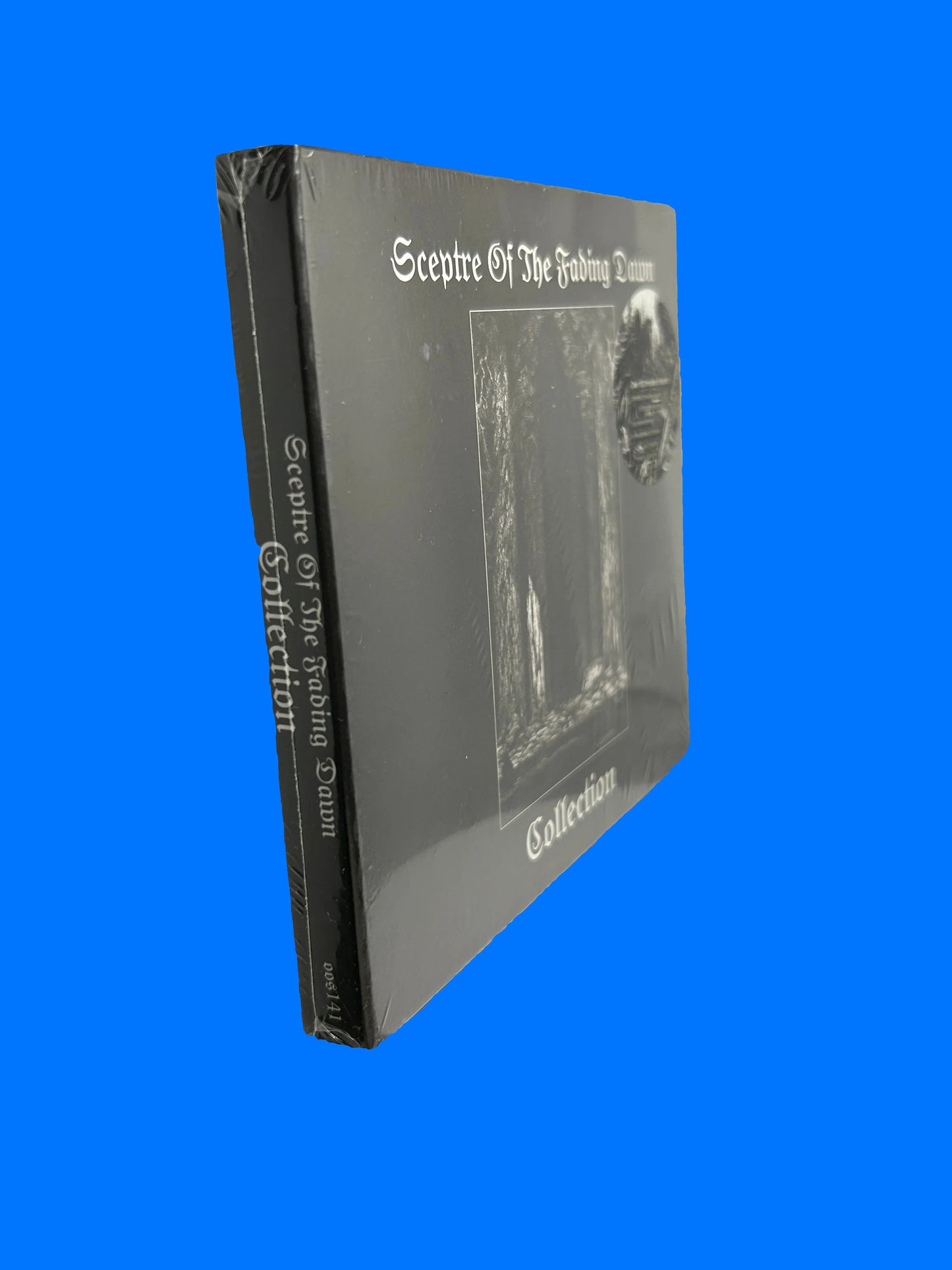 CD titled 'Sceptre of the Fading Dawn Collection' being scanned by a white machine.